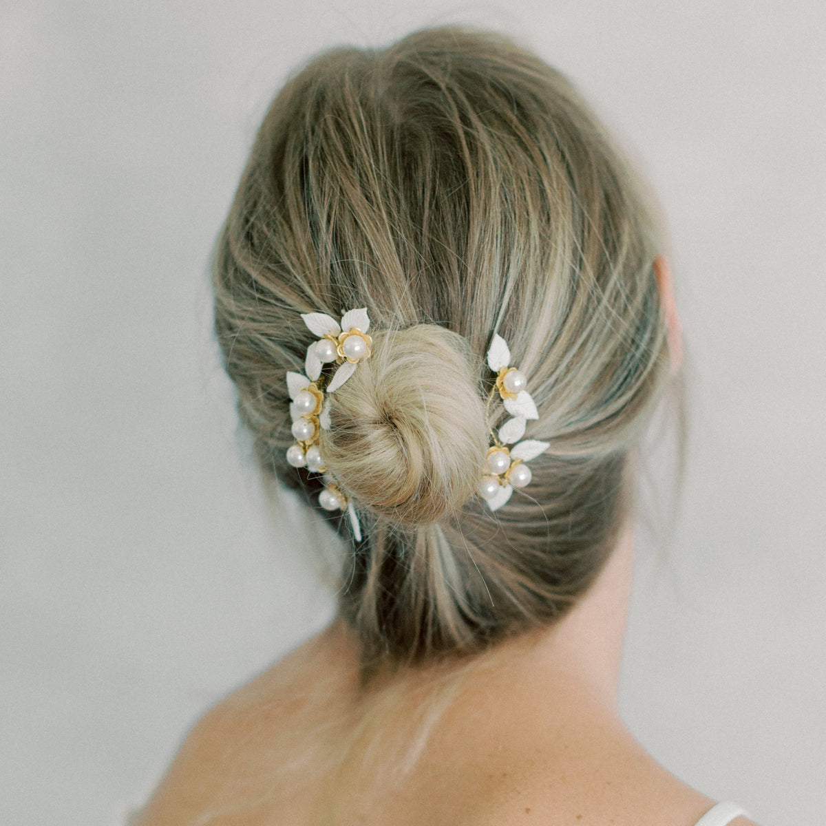 wedding hair combs set with white leaves and brass flower - style 22013